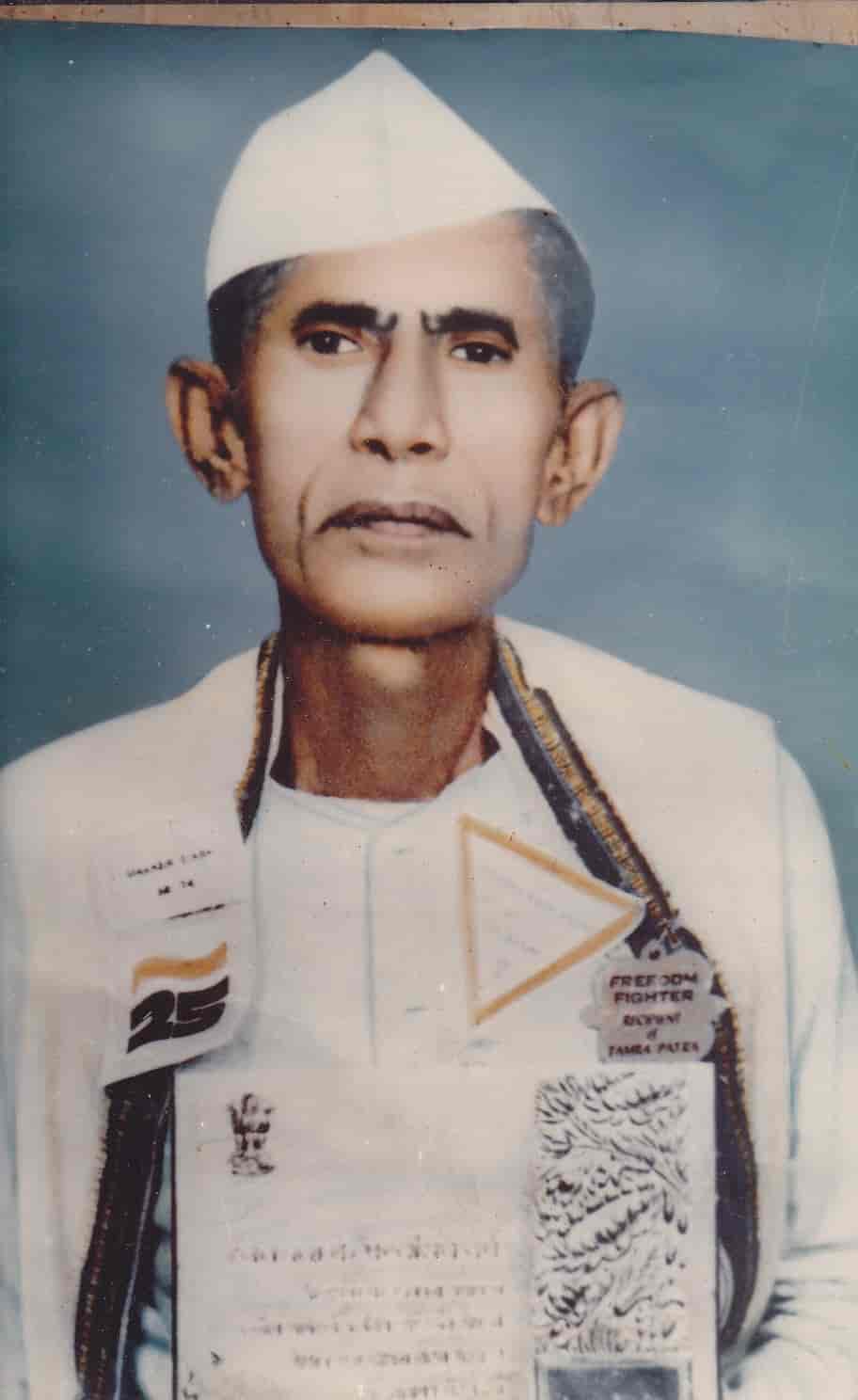 Portrait of Mahavir Singh (1907–1992) in Gandhi cap with freedom-fighter insignia