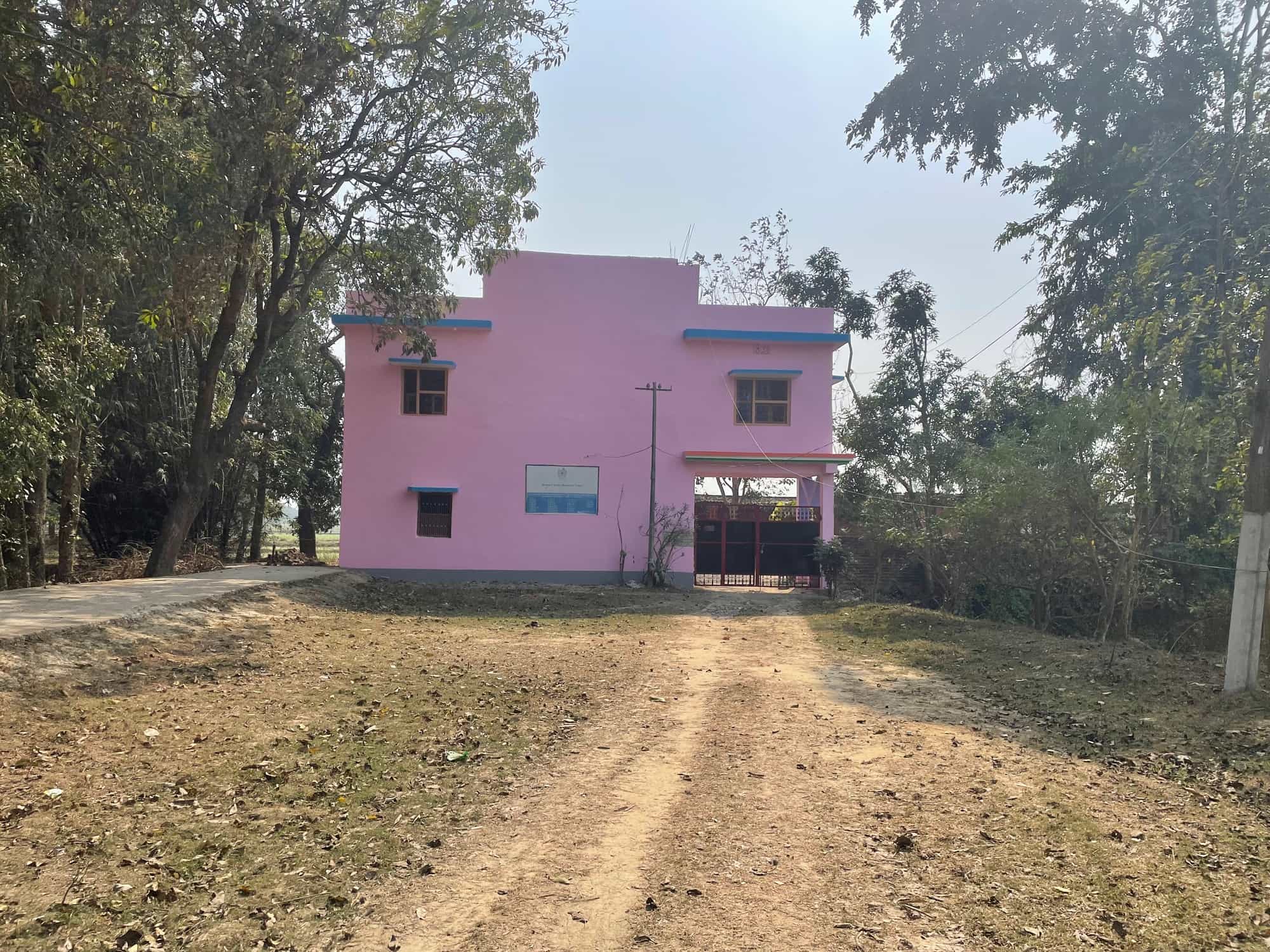 The Trust's pink building in Bishnupur — its home since the 1990s